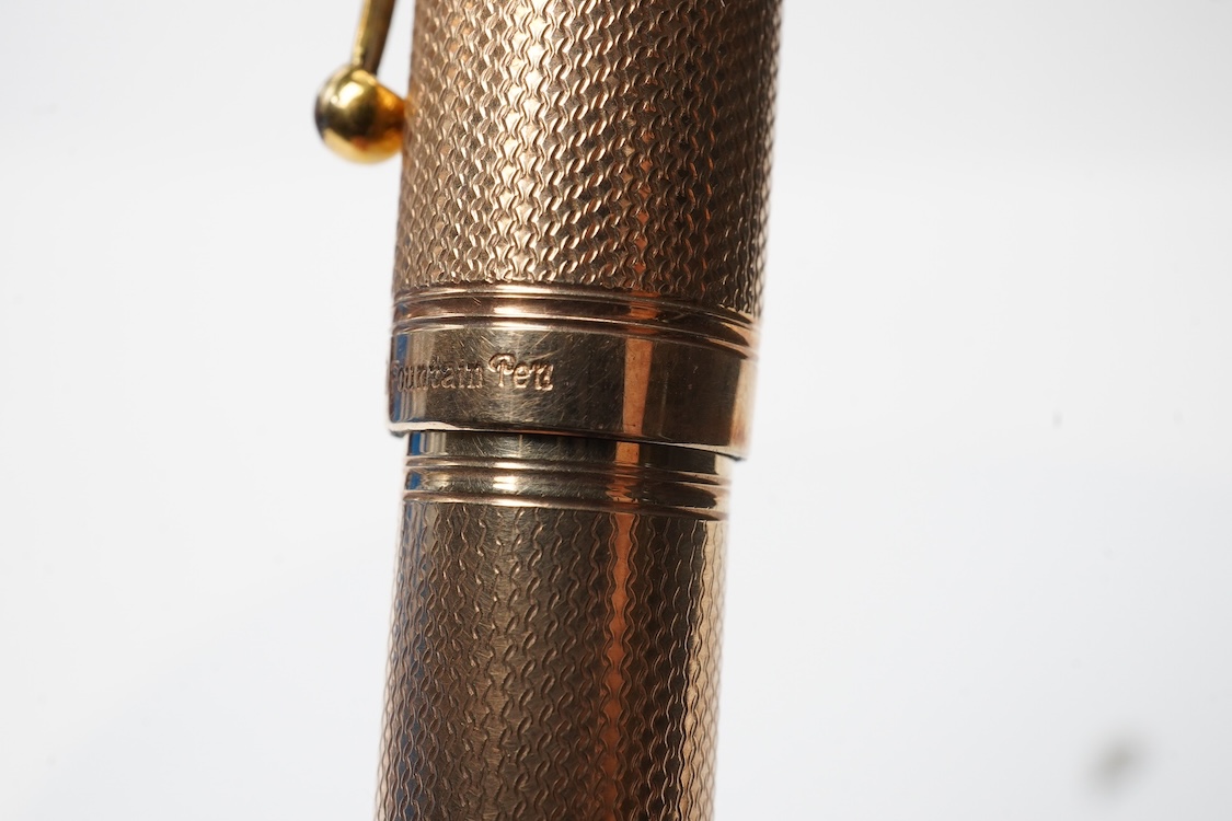 A large Waterman fully covered gold filled fountain pen, lever filler, in fine barley pattern - No.2 Waterman nib